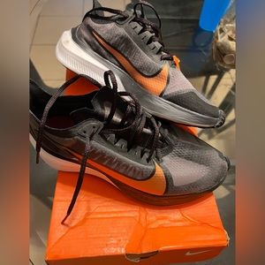 Nike Zoom Gravity shoes size 8. Grey, black, orange, and white.